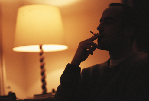 getty_rf_photo_of_man_smoking_at_night
