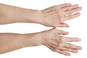 The hands of an old man on a white background
