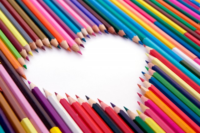 A lot of crayons and the white heart