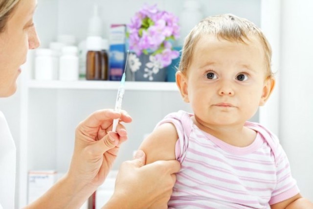 Baby Girl Patient Receiving Vaccine at doctor's office